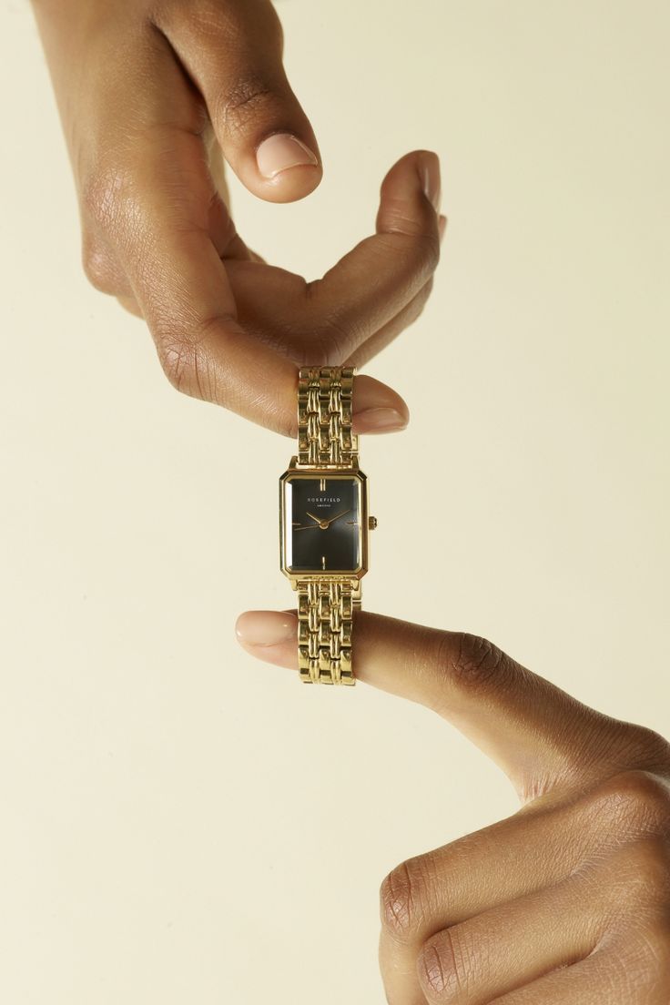 Minimalist Hands Presenting Gold Watch Genflow template preview