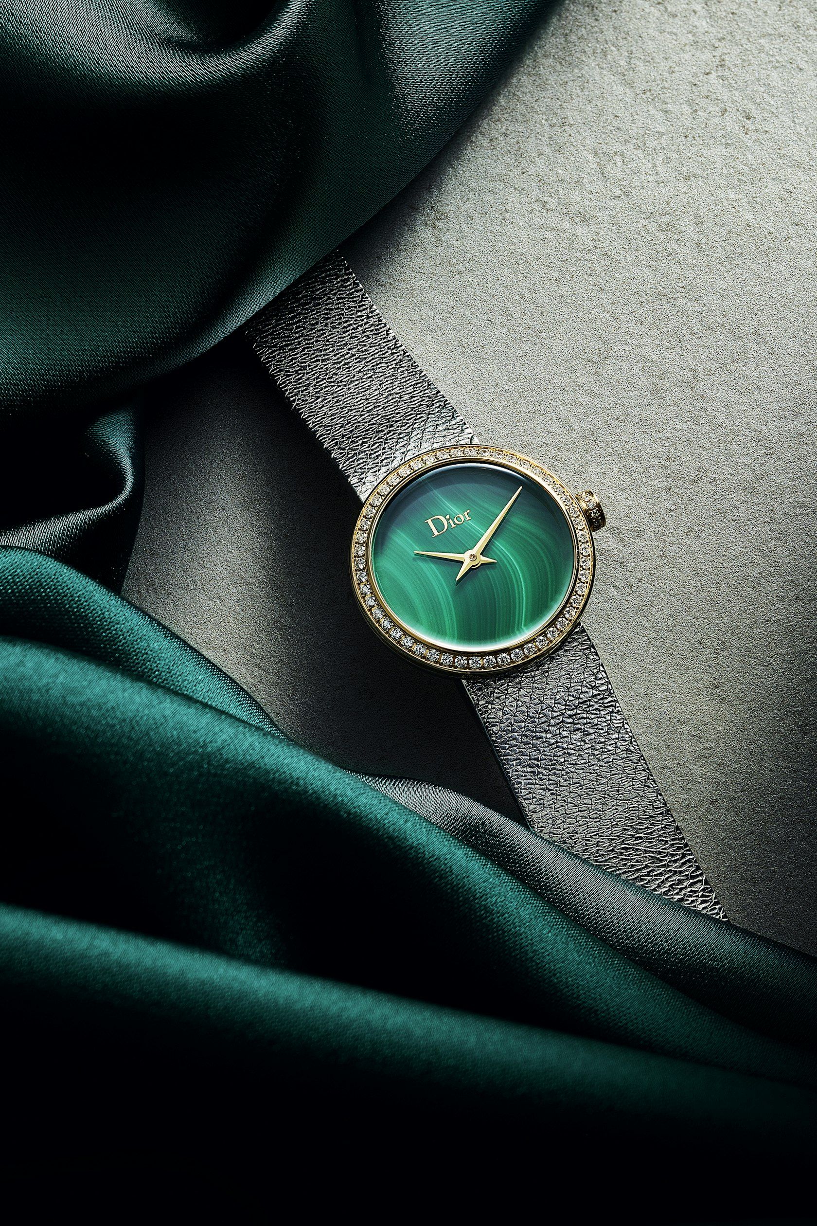 Emerald Dial Luxury Watch On Silk Genflow template preview