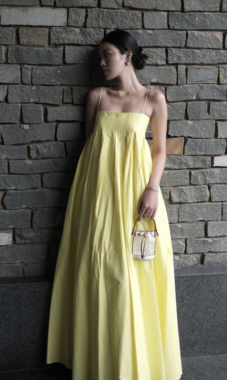 Elegant Yellow Dress Stone Wall Portrait Genflow template preview