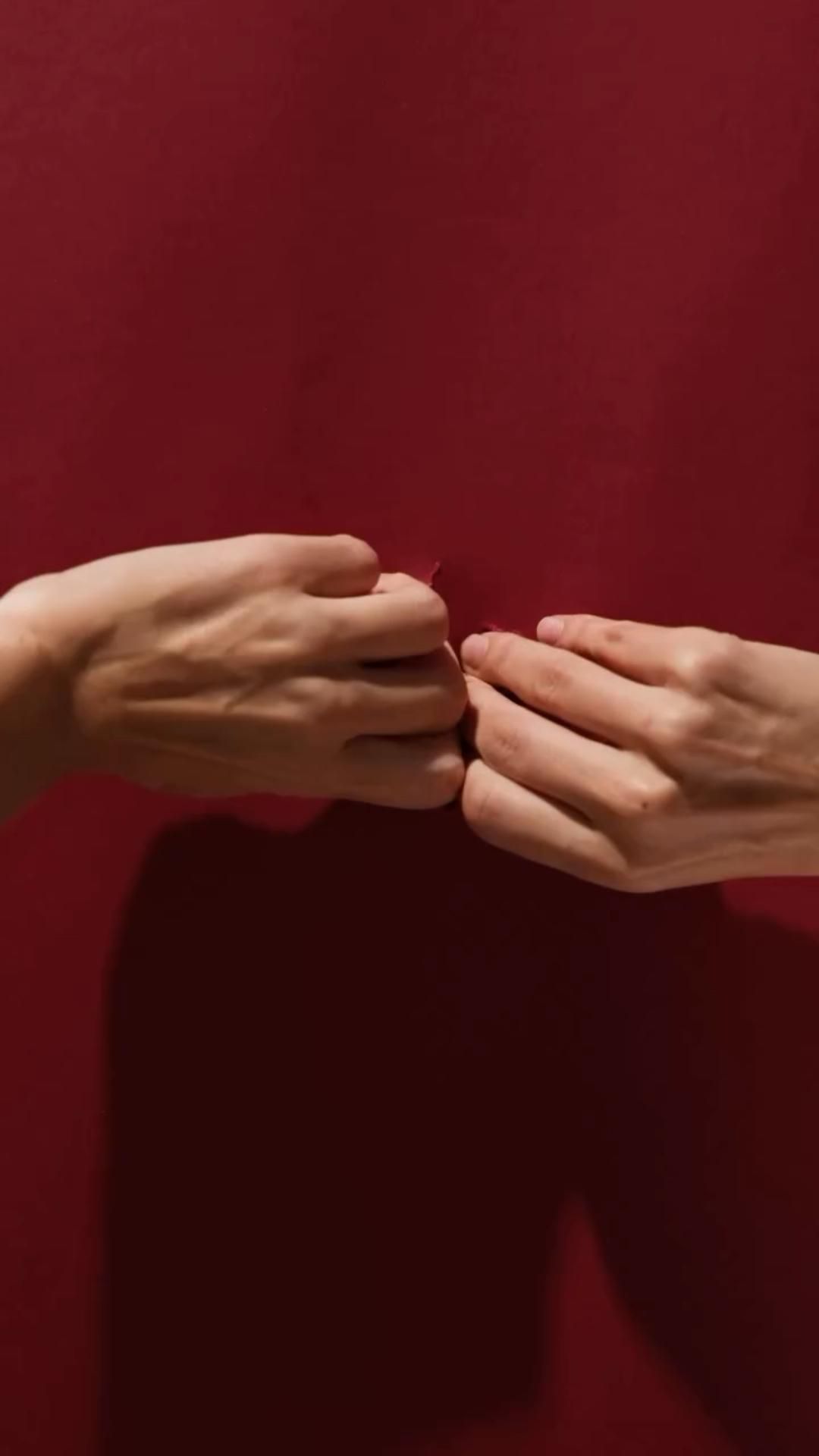 Minimalist Hands Tearing Red Paper Genflow template preview