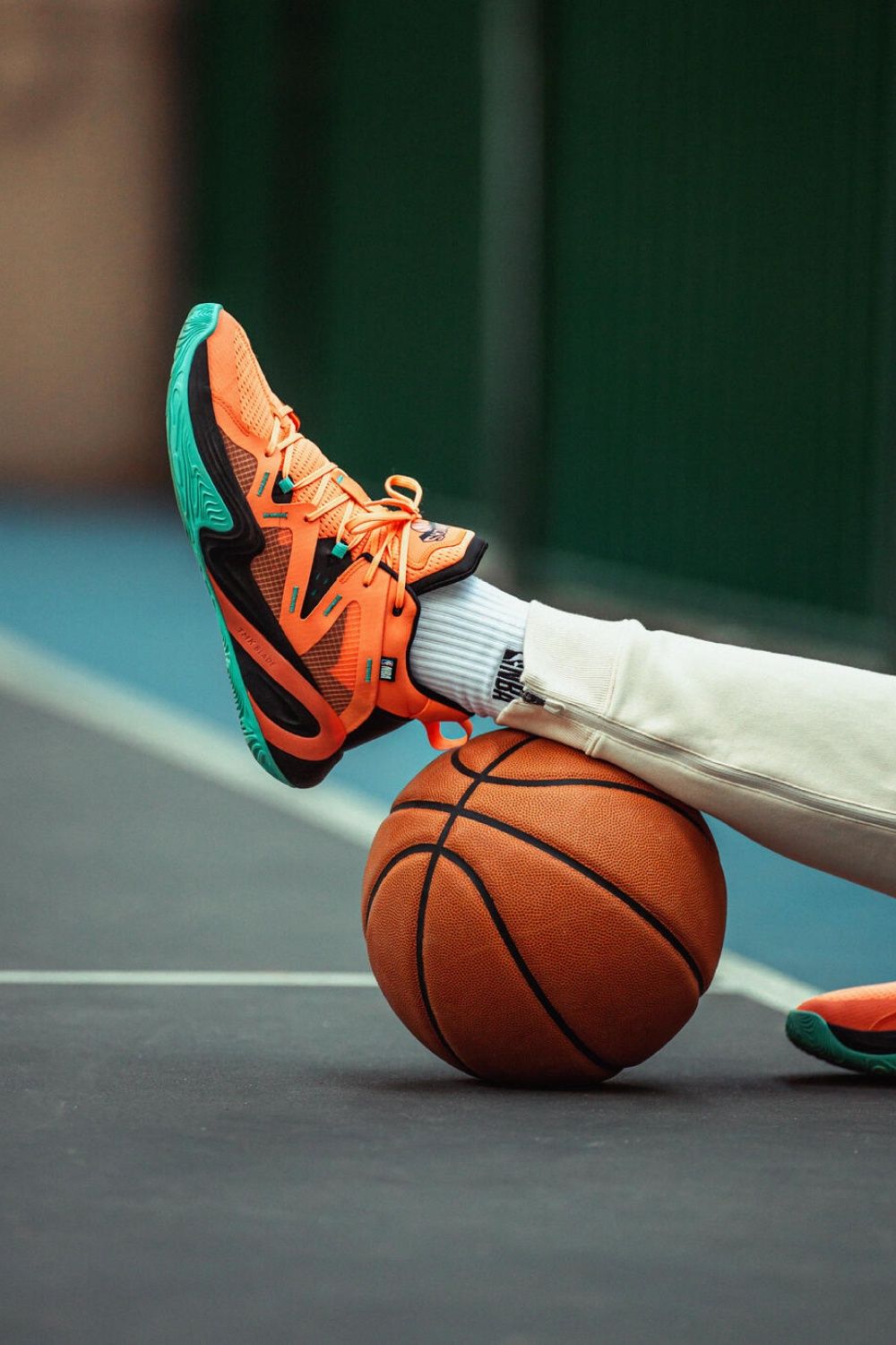 A Person Is Sitting On Top Of A Basketball While Creative Design Generator Genflow template preview