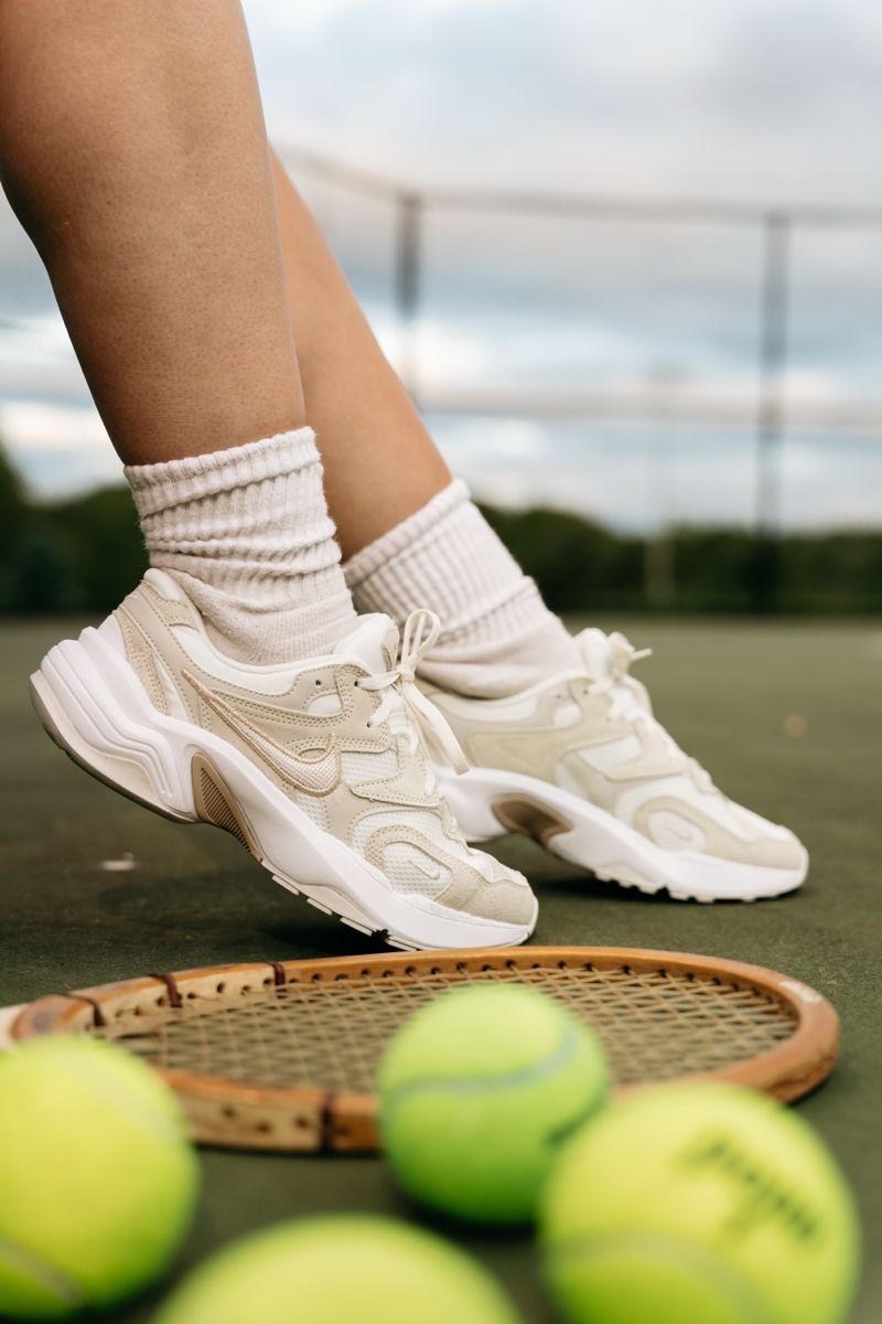 A Tennis Player'S Shoes And Racket Are On The Court Creative Design Generator Genflow template preview