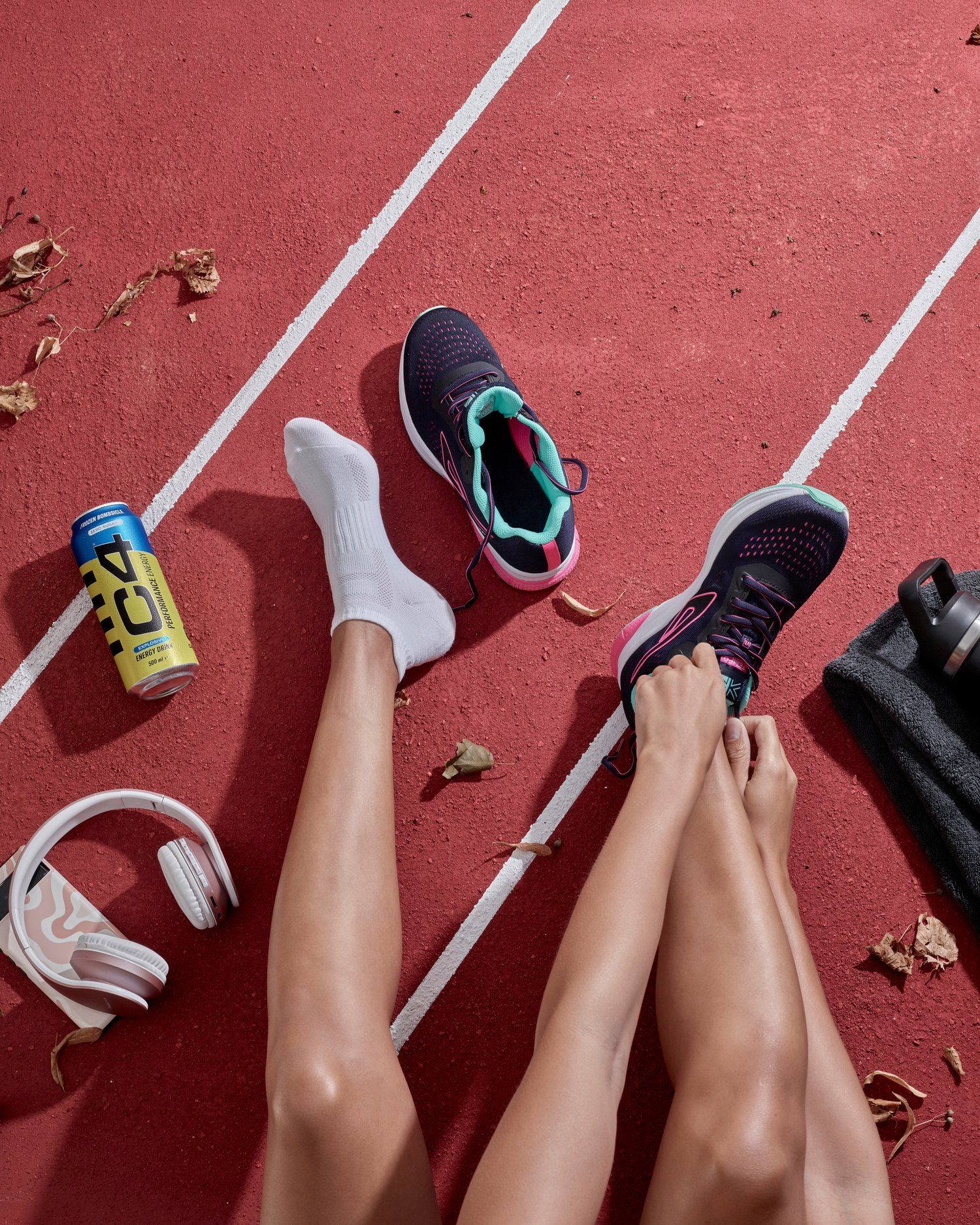Model sitting on running track having refreshing drink Creative Design Generator Genflow テンプレートプレビュー