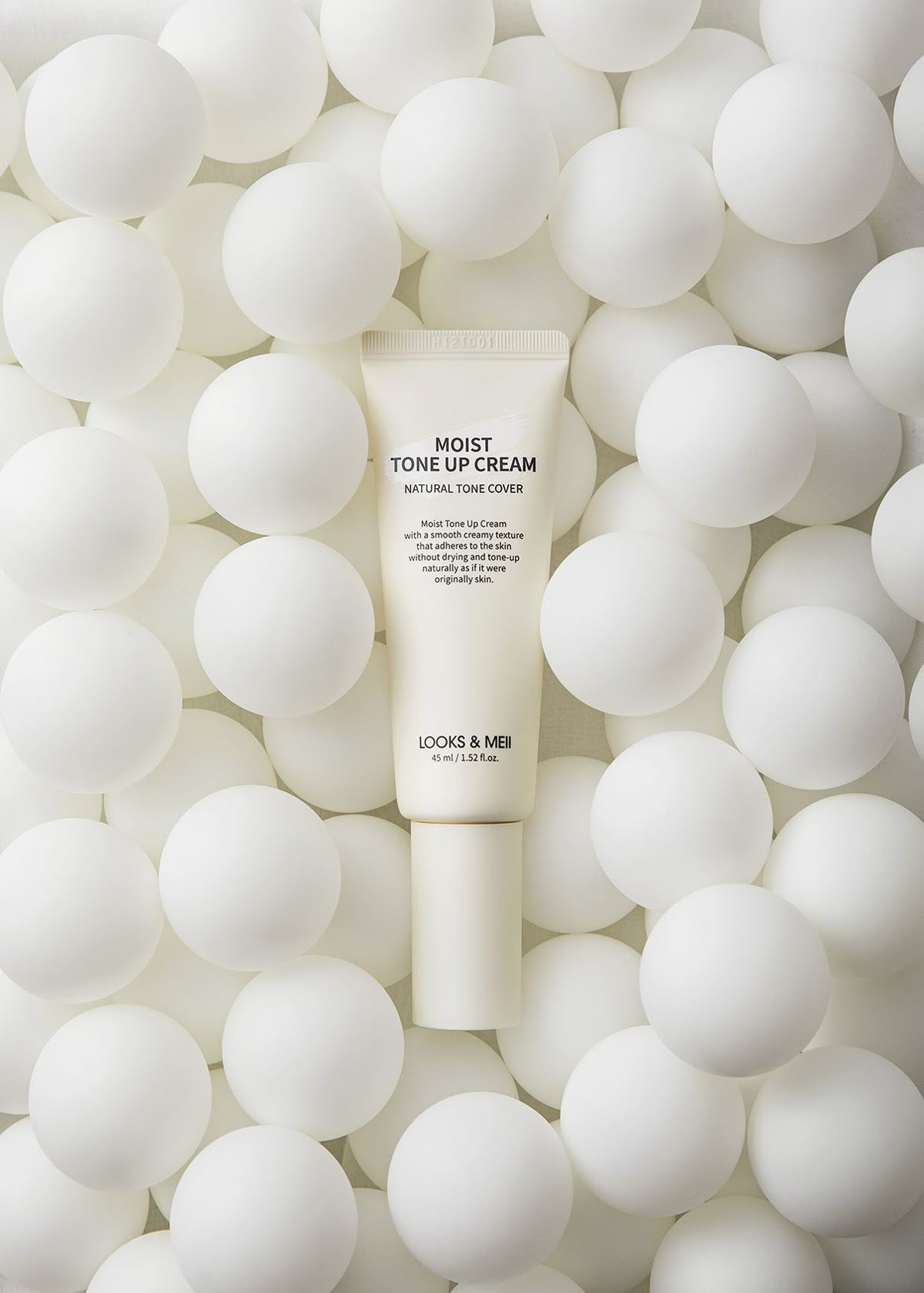 This May Contain: Some White Balls And A Tube Of Cream Creative Design Generator Genflow テンプレートプレビュー