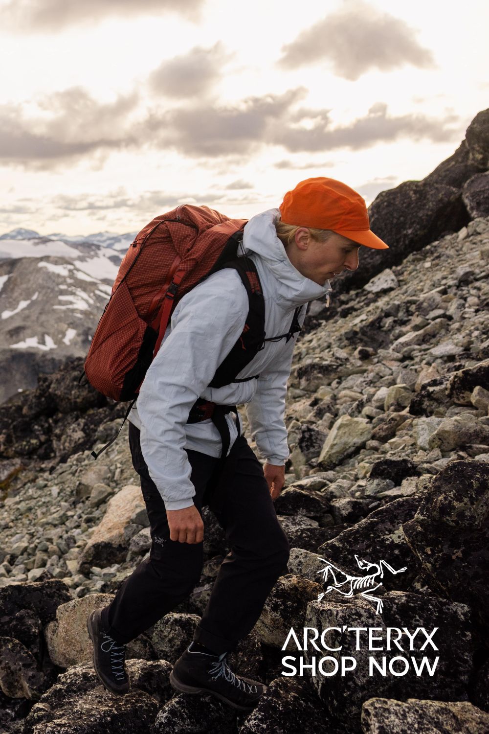 A Man Hiking Up A Rocky Mountain With A Backpack On His Back And The Words Arctery Shop No Creative Design Generator Genflow テンプレートプレビュー