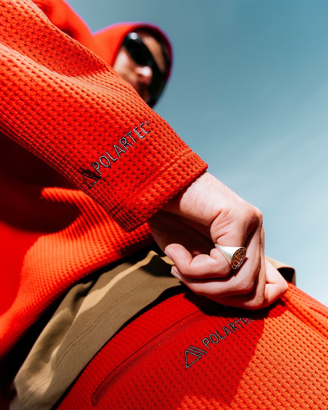 A Person Wearing An Orange Jacket With The Word Jogger Written On It Creative Design Generator Genflow テンプレートプレビュー